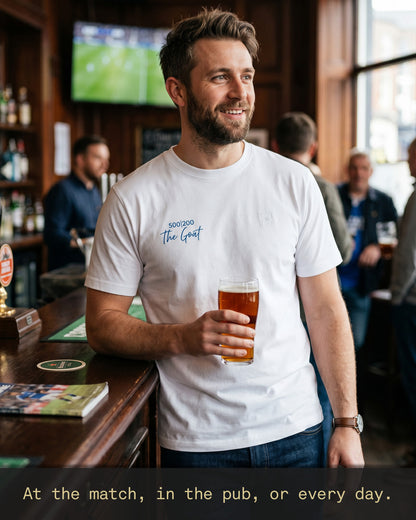 Jamie Vardy 500 Appearances 200 Goals Legacy T-shirt worn by a fan in a pub, styled for matchdays, social occasions and everyday wear.